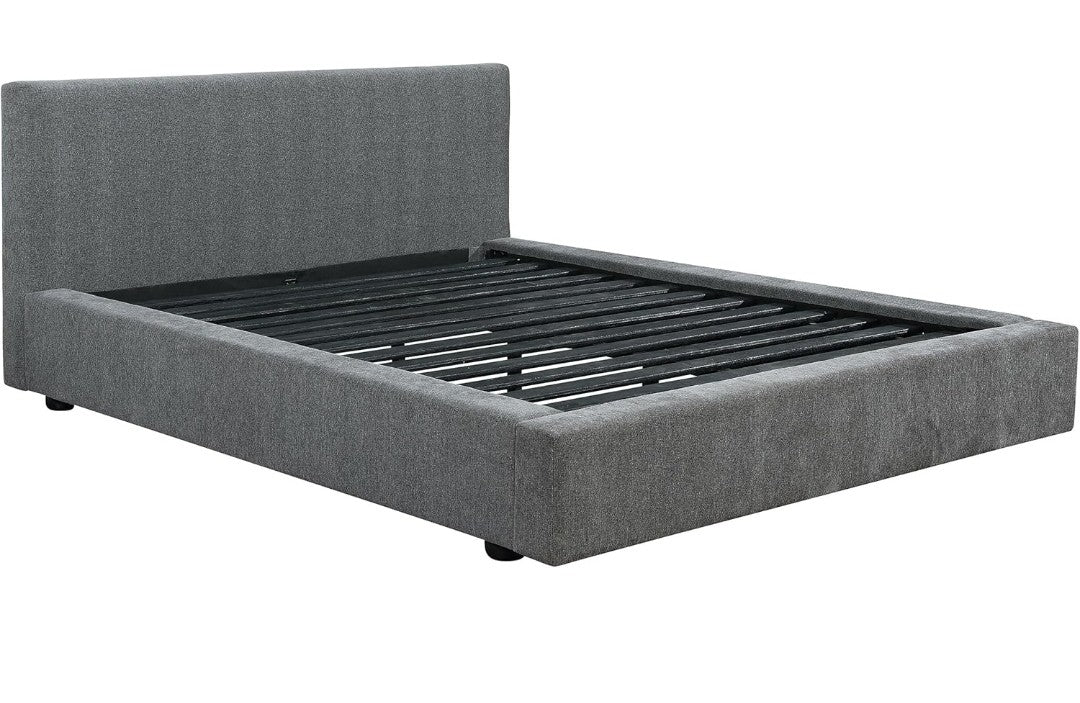 Gredory upholstered eastern King panel bed graphite